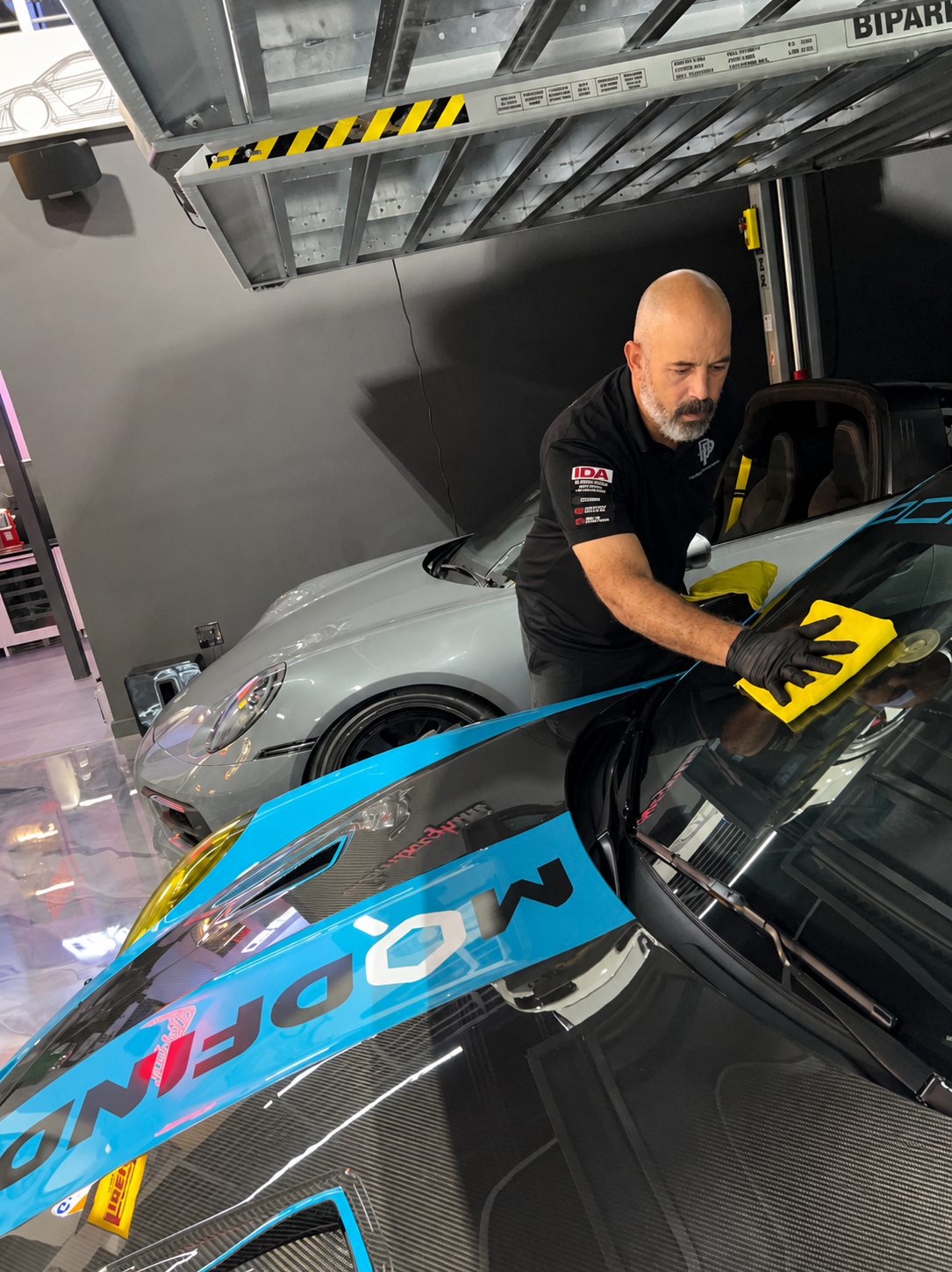 Angel Moreno performing paint correction at Purple Brothers Motorspace